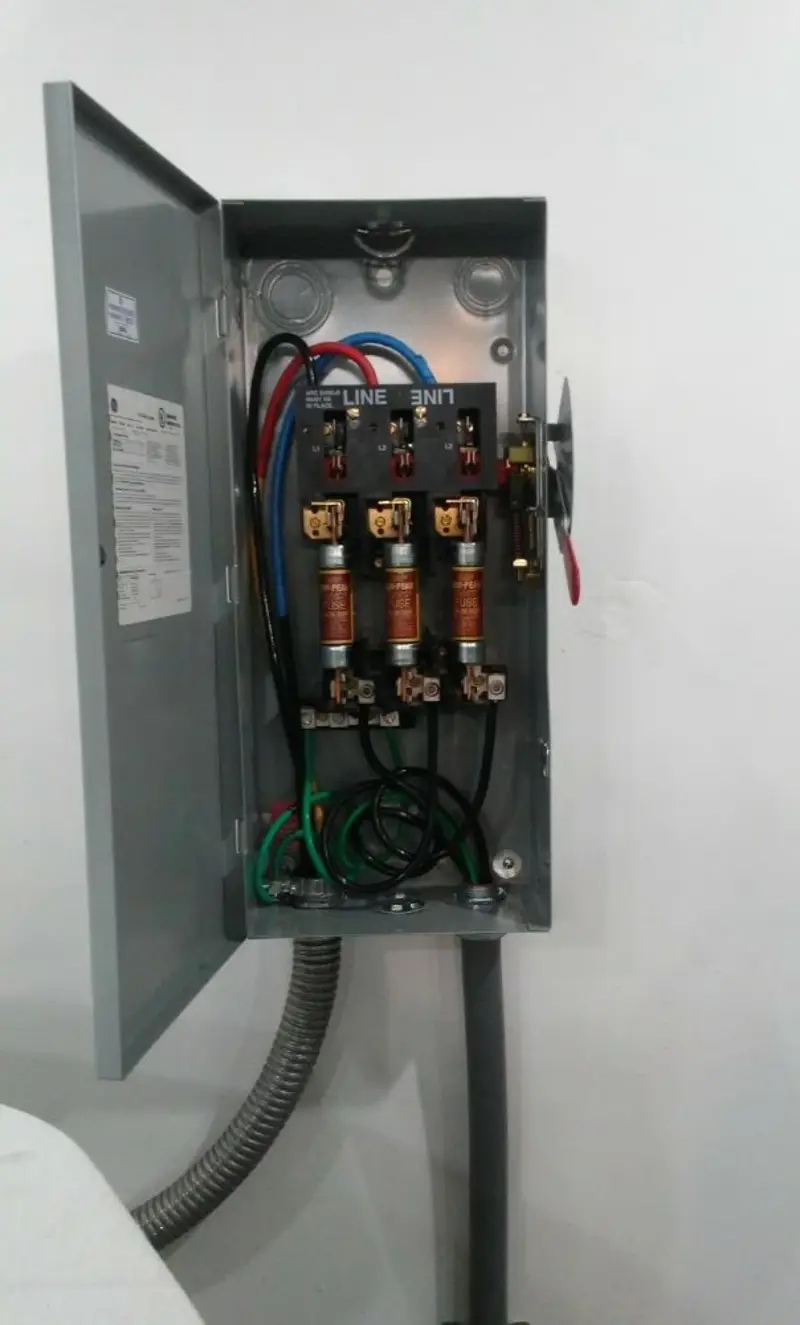 Three-phase disconnect switch installed for Smoke Detector Installation in Island Park